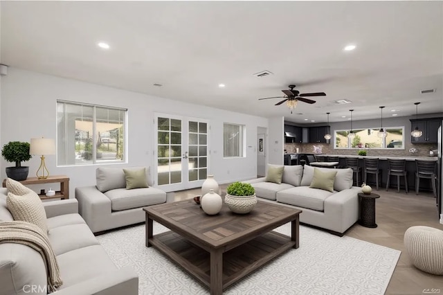 2485 W Westward Ave, Banning, CA 92220 - living room with french doors, a ceiling fan, and recessed lighting