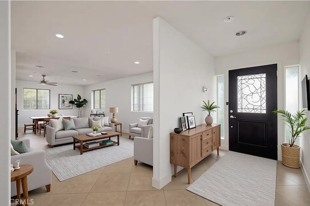 2485 W Westward Ave, Banning, CA 92220 - entrance foyer with healthy amount of natural light, light tile patterned flooring, a ceiling fan, and recessed lighting