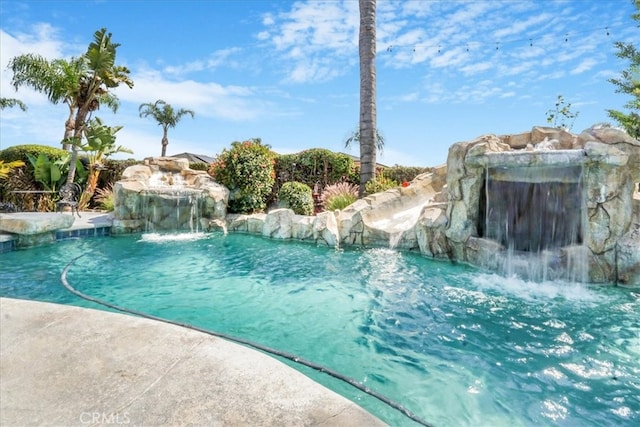 view of pool with a fenced in pool