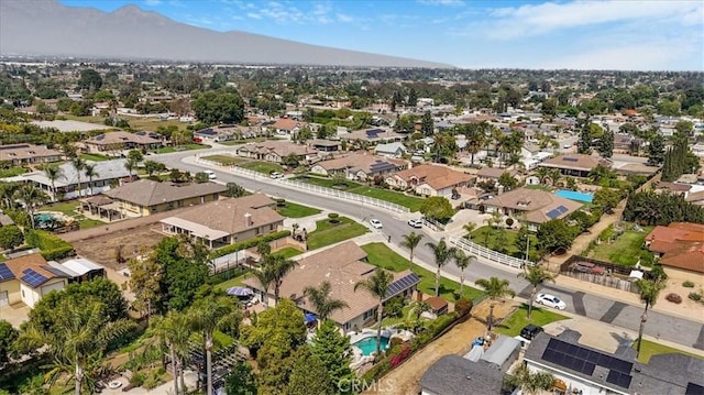birds eye view of property featuring a residential view and a mountain view