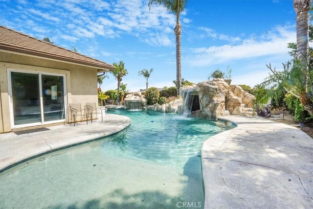 pool with a patio