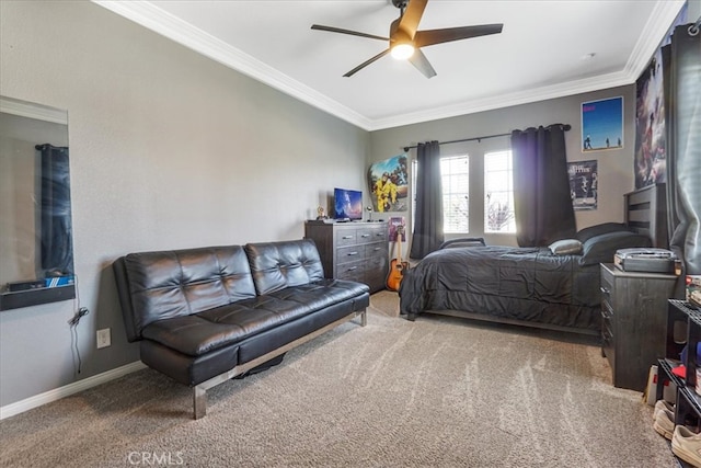 carpeted bedroom featuring crown molding, baseboards, and ceiling fan