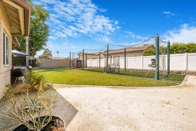 view of yard featuring a fenced backyard and a patio