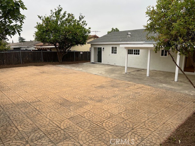 10065 Tudor Ave, Montclair, CA 91763 - exterior space with fence and a patio