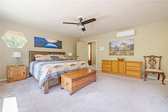 bedroom with a ceiling fan, baseboards, light colored carpet, and a wall unit AC