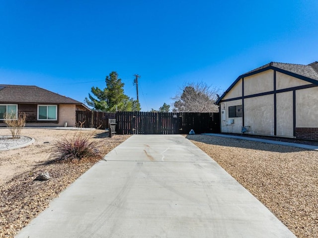 view of home's exterior featuring fence