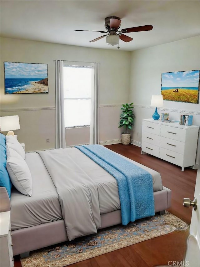 12851 Oakdale St, Eastvale, CA 92880 - bedroom with wood finished floors, a ceiling fan, and baseboards