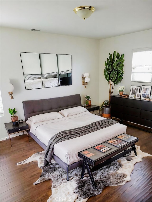 12851 Oakdale St, Eastvale, CA 92880 - bedroom with dark wood-type flooring