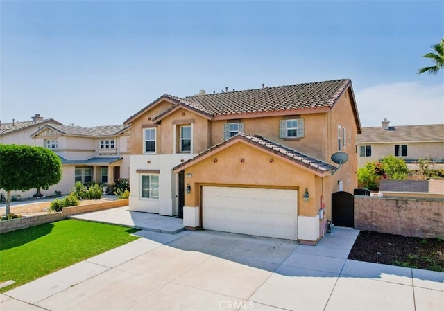 12851 Oakdale St, Eastvale, CA 92880 - view of front of property with driveway, stucco siding, a tiled roof, a garage, and a front yard