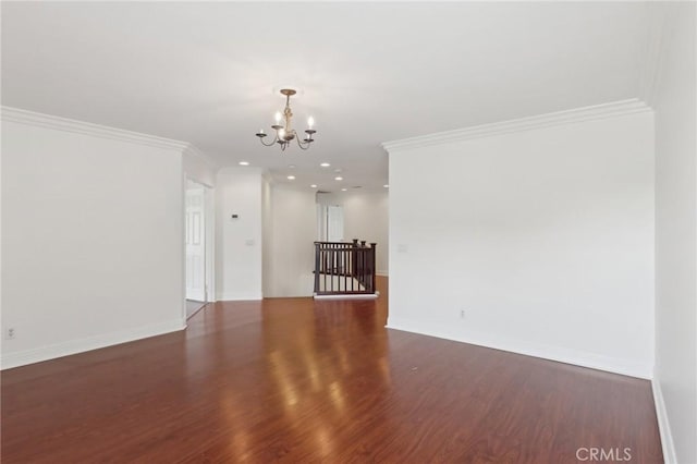 12851 Oakdale St, Eastvale, CA 92880 - unfurnished living room featuring a chandelier, wood finished floors, crown molding, baseboards, and recessed lighting