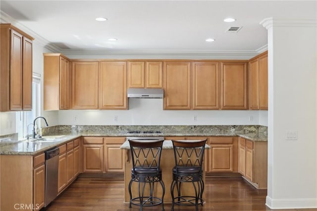 12851 Oakdale St, Eastvale, CA 92880 - kitchen featuring under cabinet range hood, a sink, dishwasher, dark wood finished floors, and recessed lighting