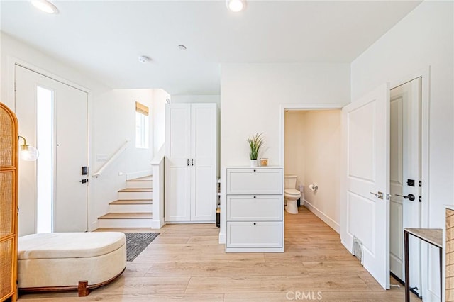 11751 Florence Ave, Santa Fe Springs, CA 90670 - entrance foyer featuring recessed lighting, stairs, and light wood-style flooring