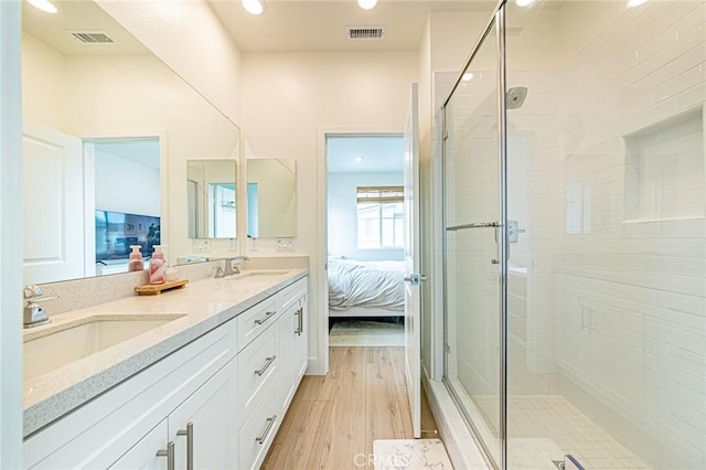 11751 Florence Ave, Santa Fe Springs, CA 90670 - ensuite bathroom featuring a sink, a stall shower, ensuite bath, and visible vents
