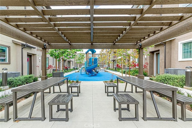 11751 Florence Ave, Santa Fe Springs, CA 90670 - view of swimming pool featuring a patio, central AC, a pergola, and outdoor dining space