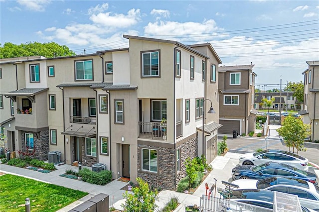 11751 Florence Ave, Santa Fe Springs, CA 90670 - view of building exterior featuring central AC unit and a residential view