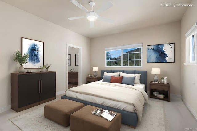bedroom with baseboards, multiple windows, and connected bathroom