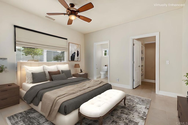 bedroom with a ceiling fan, visible vents, light tile patterned floors, baseboards, and ensuite bath