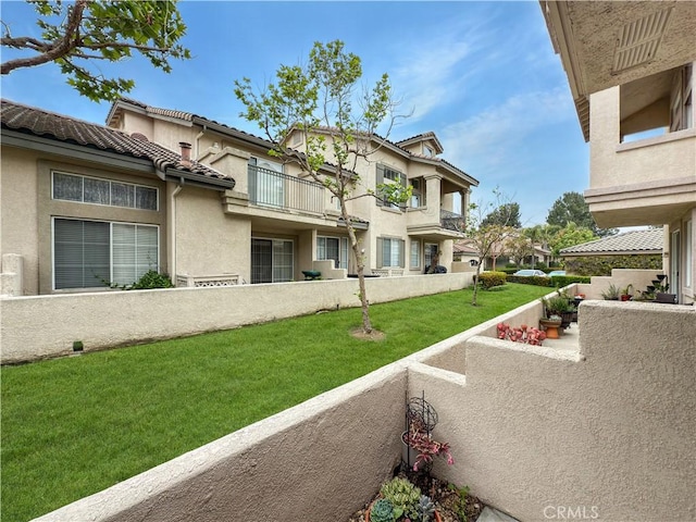 exterior space with a balcony