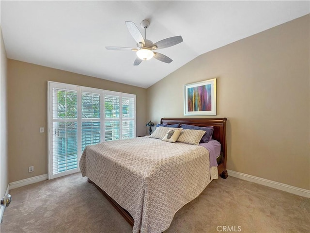 bedroom with baseboards, light colored carpet, access to exterior, and vaulted ceiling