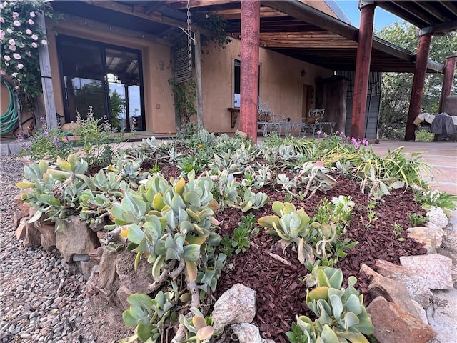 exterior space featuring stucco siding