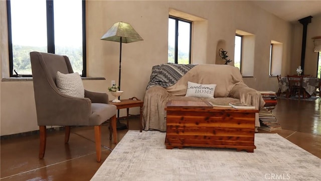 sitting room featuring a healthy amount of sunlight