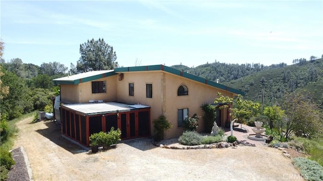 exterior space with stucco siding