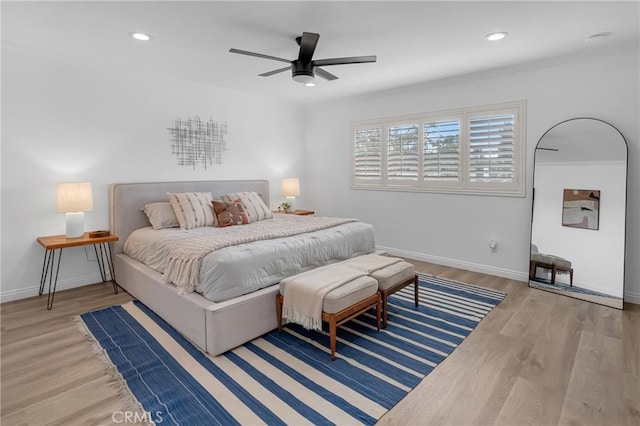 bedroom with recessed lighting, baseboards, a ceiling fan, and wood finished floors