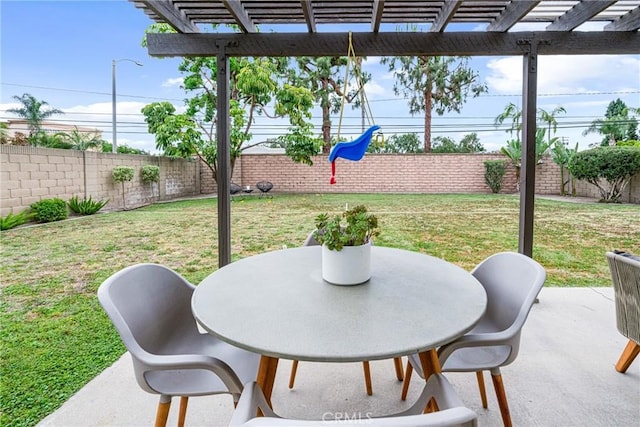 view of patio with a fenced backyard, a pergola, and outdoor dining space