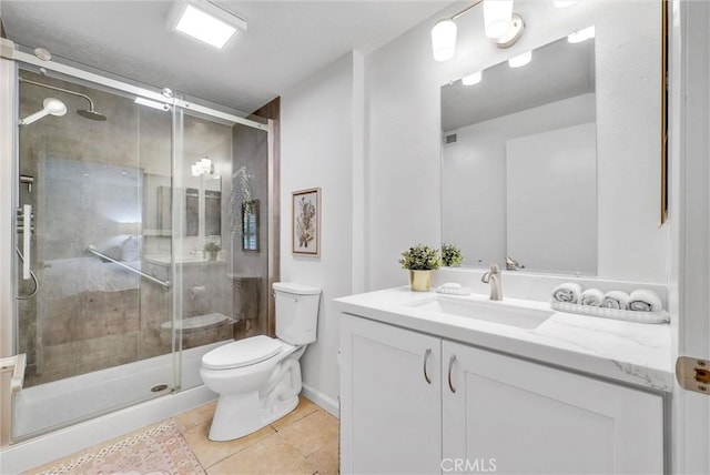 19801 Meadow Ridge Dr Unit 35, Trabuco Canyon, CA 92679 - full bath featuring vanity, a stall shower, tile patterned floors, and toilet