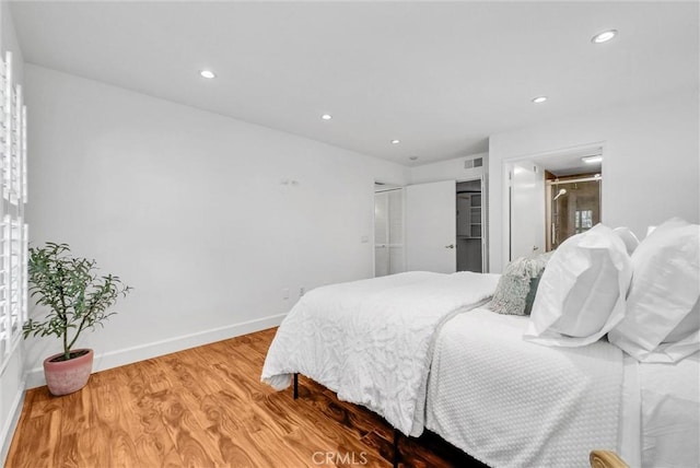 19801 Meadow Ridge Dr Unit 35, Trabuco Canyon, CA 92679 - bedroom with recessed lighting, baseboards, visible vents, and wood finished floors