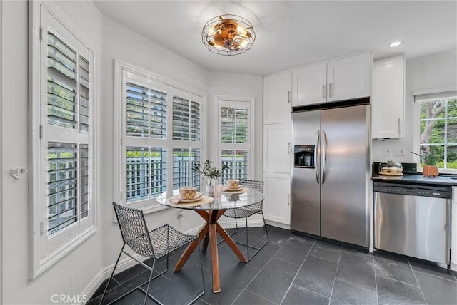 19801 Meadow Ridge Dr Unit 35, Trabuco Canyon, CA 92679 - kitchen featuring recessed lighting, dark tile patterned floors, appliances with stainless steel finishes, and white cabinets