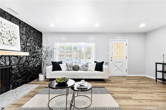 12748 Paramount Blvd, Downey, CA 90242 - living area with a fireplace, wood finished floors, and recessed lighting