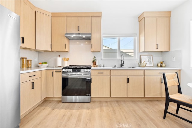 12748 Paramount Blvd, Downey, CA 90242 - kitchen featuring stainless steel appliances and light brown cabinets