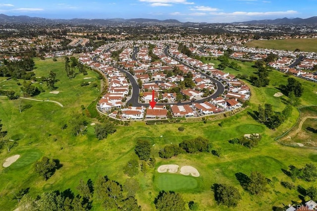 4905 Alicante Way, Oceanside, CA 92056 - aerial view of property and surrounding area with nearby suburban area, a mountainous background, and a local golf course