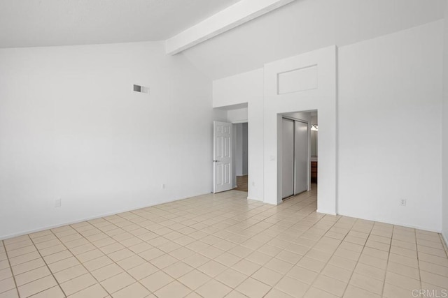 4905 Alicante Way, Oceanside, CA 92056 - unfurnished room featuring beam ceiling, high vaulted ceiling, and light tile patterned floors