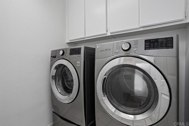 4905 Alicante Way, Oceanside, CA 92056 - clothes washing area featuring cabinet space and independent washer and dryer