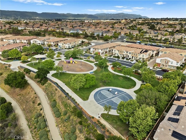 birds eye view of property featuring a mountain view and a residential view