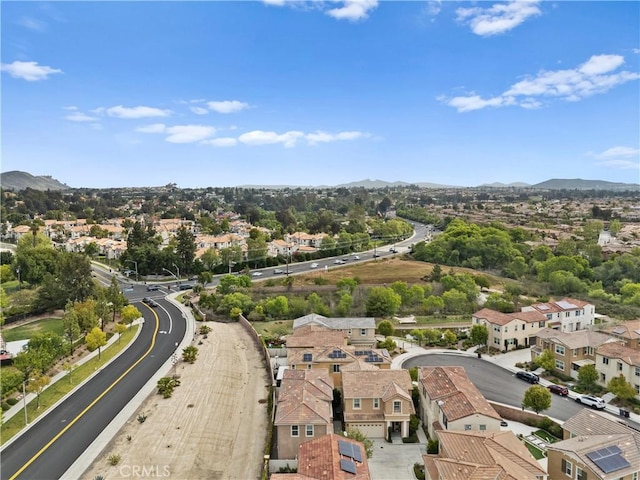 drone / aerial view with a residential view and a mountain view