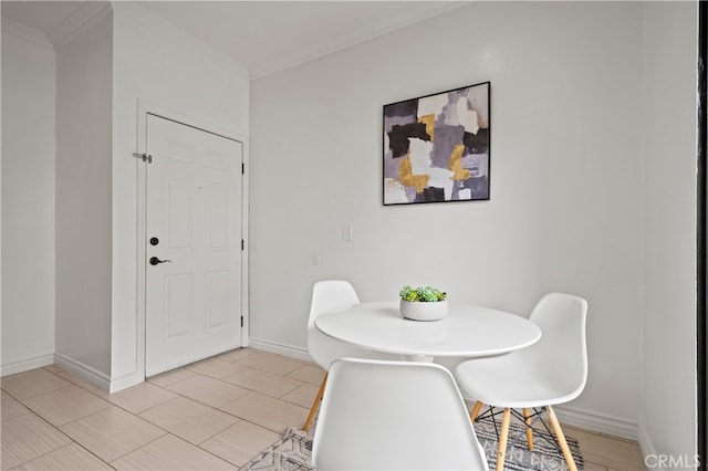 730 W 4th St Unit 307, Long Beach, CA 90802 - dining area featuring baseboards and ornamental molding