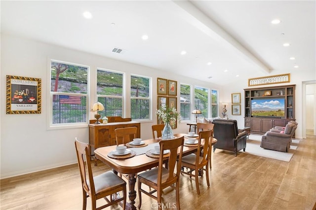 dining area with visible vents, recessed lighting, light wood finished floors, and lofted ceiling with beams