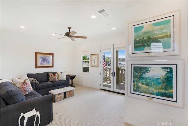 living room with recessed lighting, ceiling fan, visible vents, and carpet