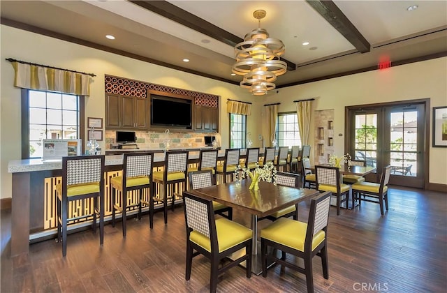 dining room featuring recessed lighting, baseboards, beamed ceiling, and dark wood finished floors