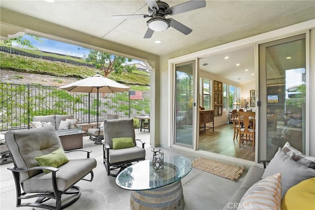 sunroom featuring recessed lighting