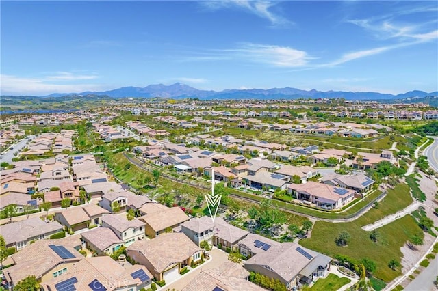 bird's eye view with a residential view and a mountain view