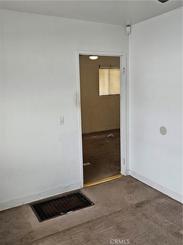 509 E 97th St, Inglewood, CA 90301 - carpeted empty room featuring visible vents and baseboards