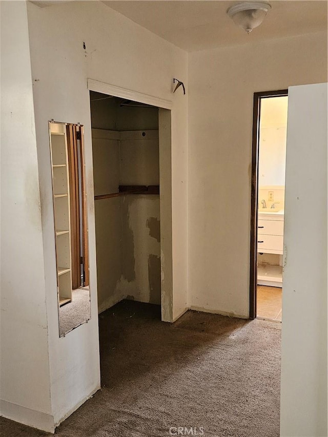 509 E 97th St, Inglewood, CA 90301 - unfurnished bedroom with carpet flooring, ensuite bath, and a closet