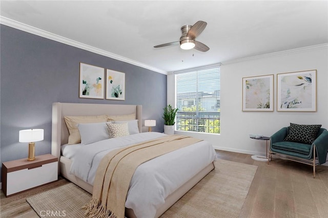 7320 Hawthorn Ave Unit 102, Los Angeles, CA 90046 - bedroom featuring ornamental molding, wood finished floors, and ceiling fan