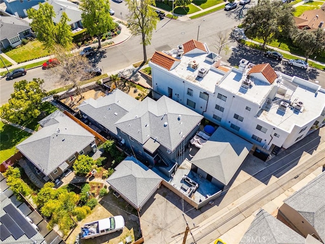 birds eye view of property with a residential view
