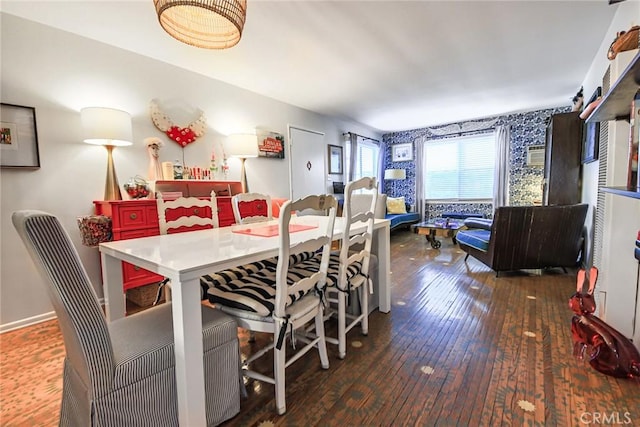 dining area with hardwood / wood-style floors