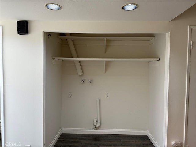 laundry room with baseboards, laundry area, dark wood finished floors, and hookup for a washing machine